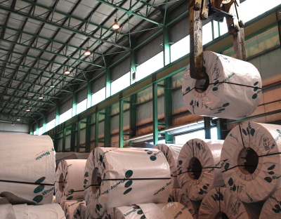 Coated steel coil on crane at WHEELING-NIPPON STEEL, INC.